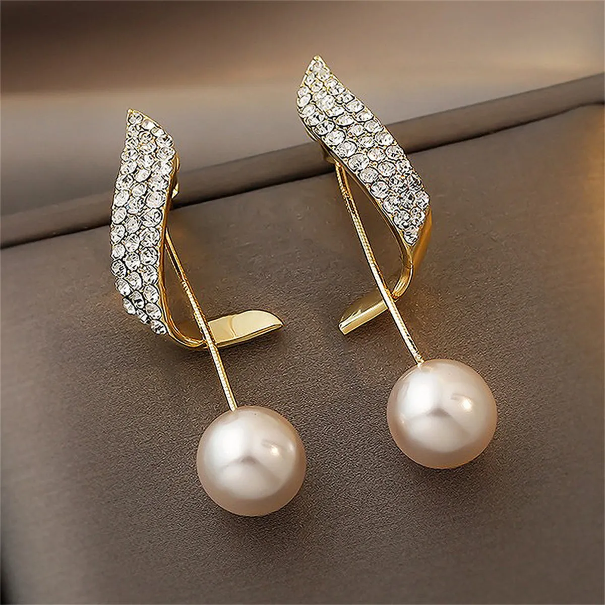Cubic Zirconia & Pearl Ribbon Ear Jackets