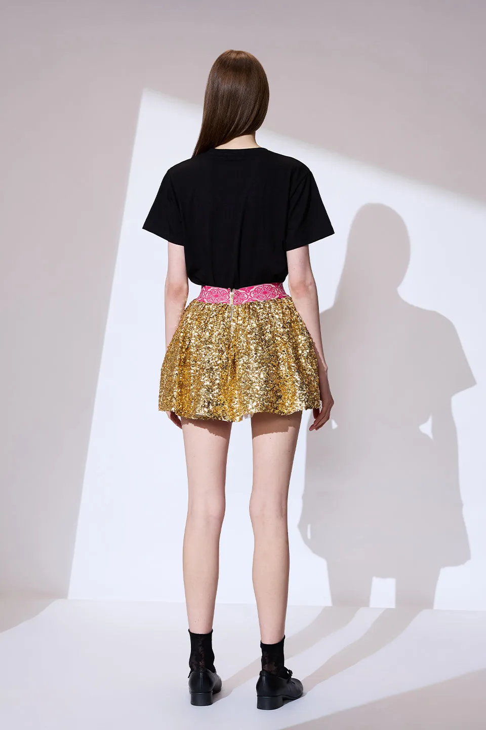 Gold sequin mini skirt