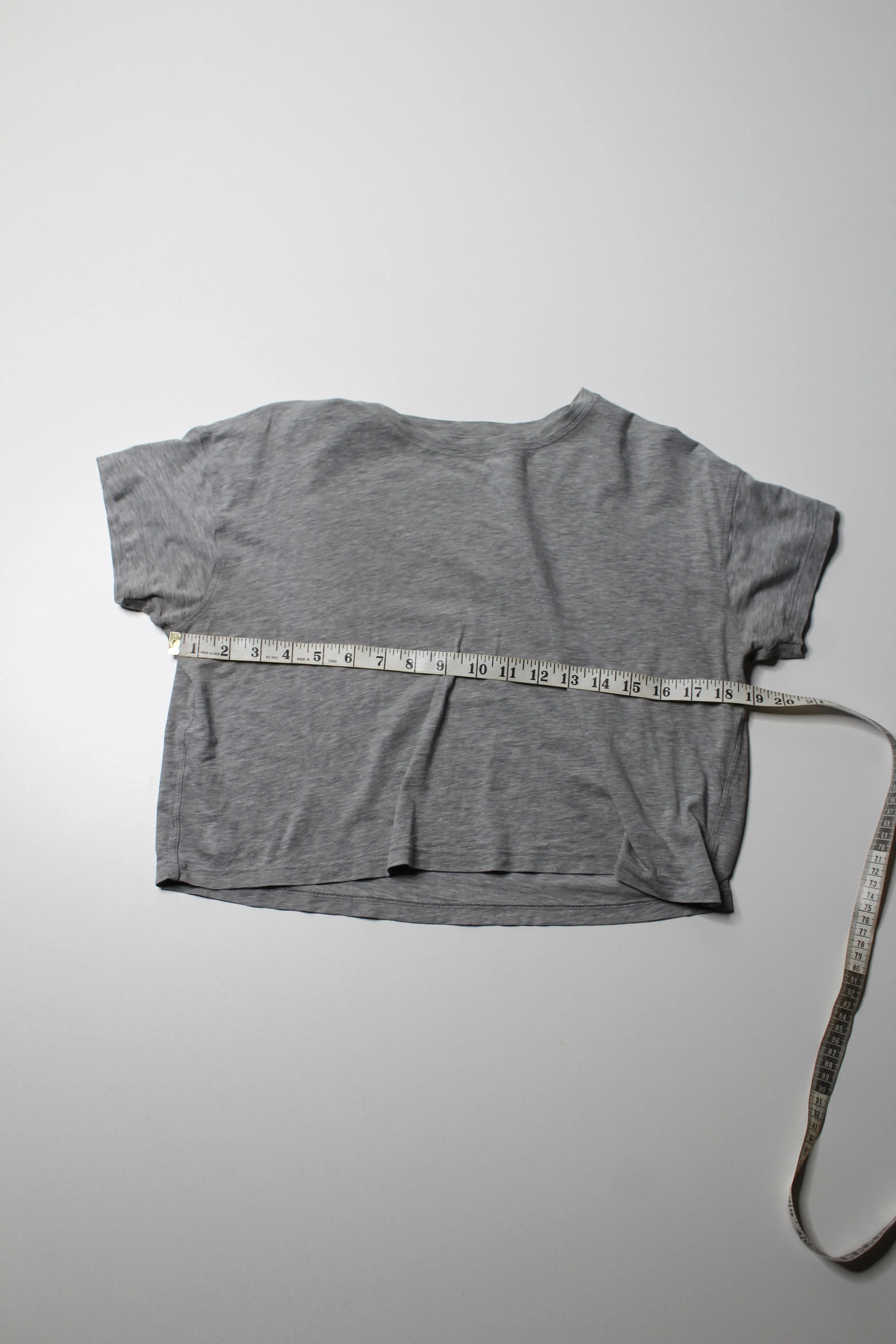 Lululemon heathered grey ‘cortes’ cropped t shirt, no size. fits like 6 (loose fit)
